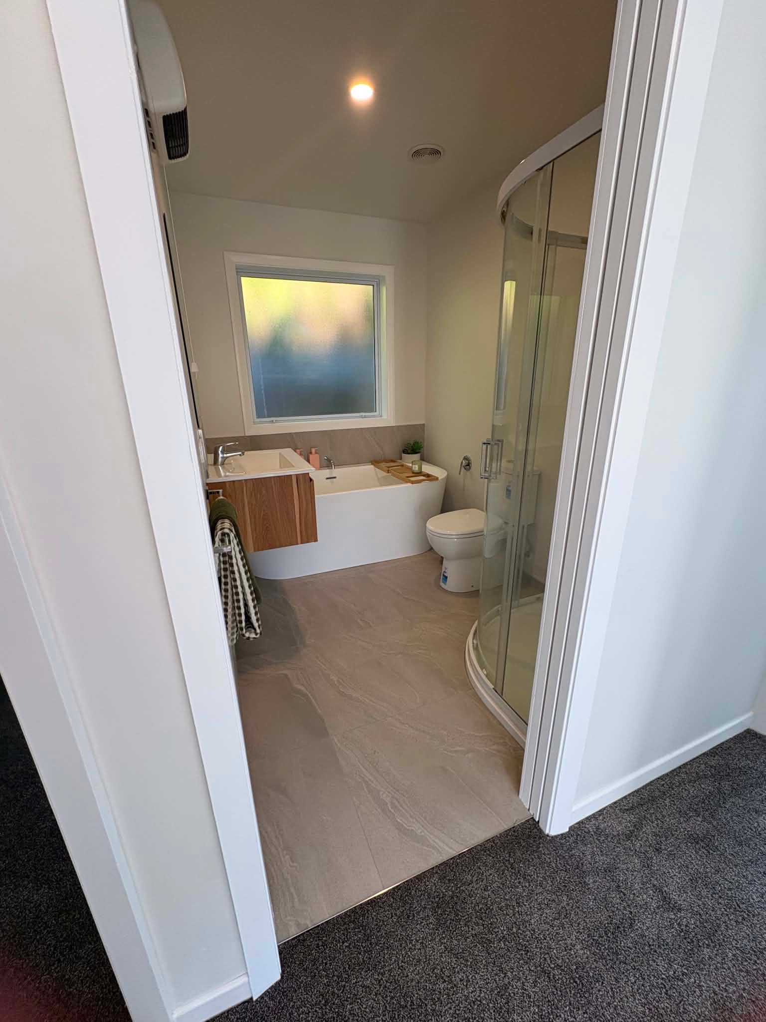 Bathroom renovation freestanding bath walk-in shower marble tile